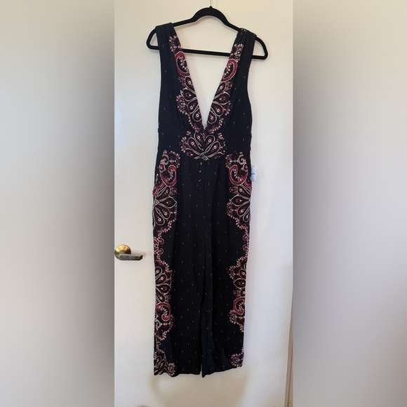 NWT Free People Setting Sun Black Print Deep V-Neck Romper in Size Small - Picture 9 of 13